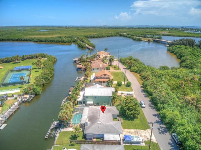Location! Location!  Location!  4 BR/2BA WATERFRONT home on the point of the Intracoastal!