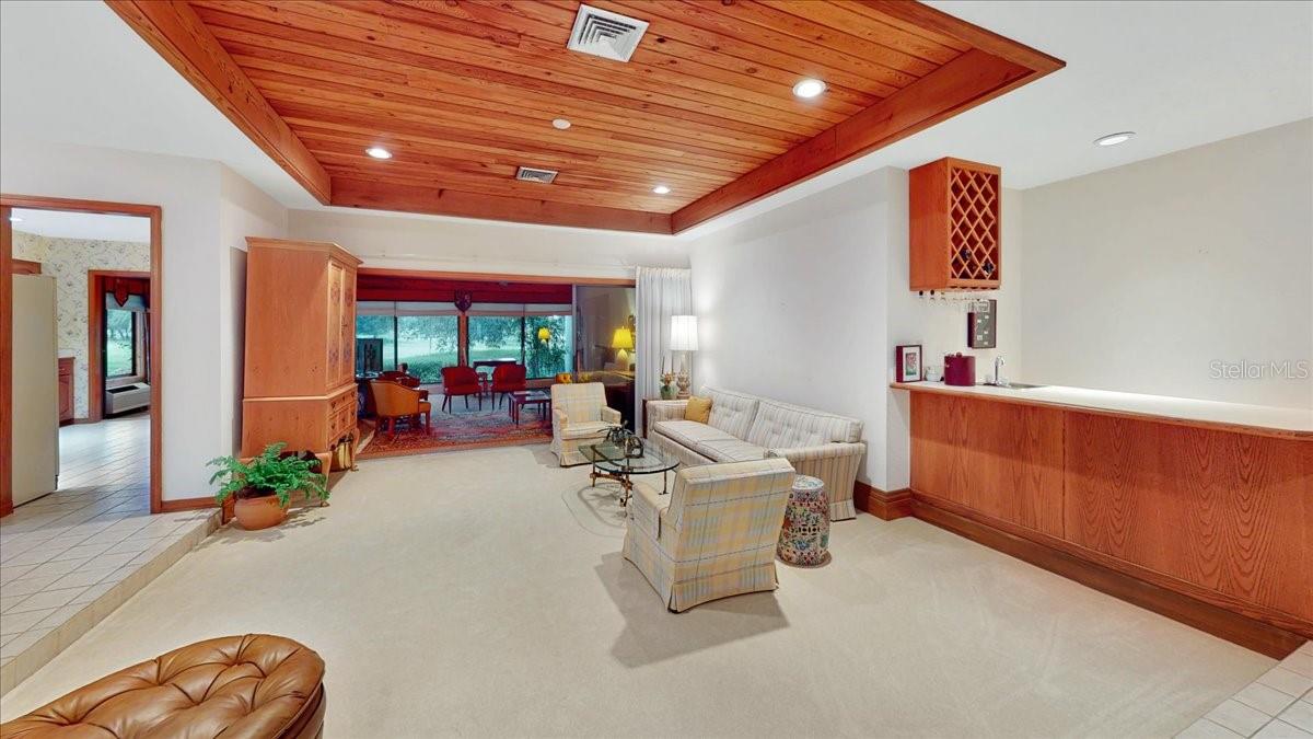 Living room with a beautiful wood ceiling
