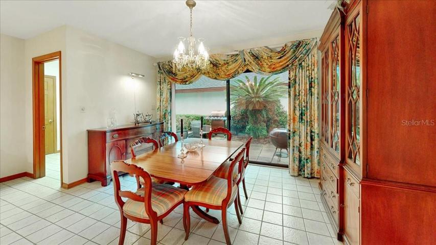 Fully equipt Dining Room with view through slider to private courtyard