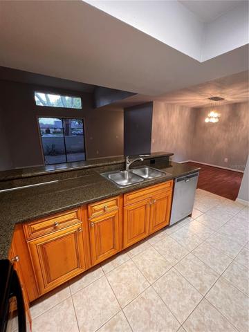 Kitchen, looking into living and dining room