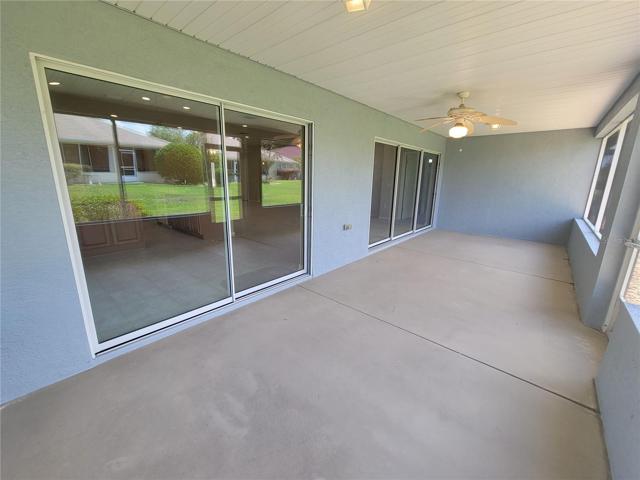 Oversized covered screened in porch.