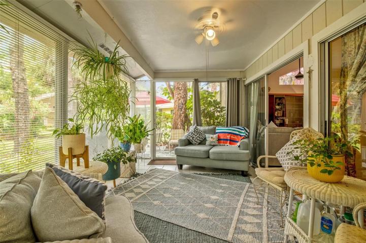 Enjoy the glassed-in patio with your friends and family