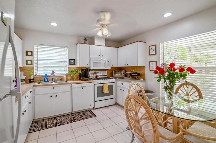 Kitchen with a service window to the living-dining room