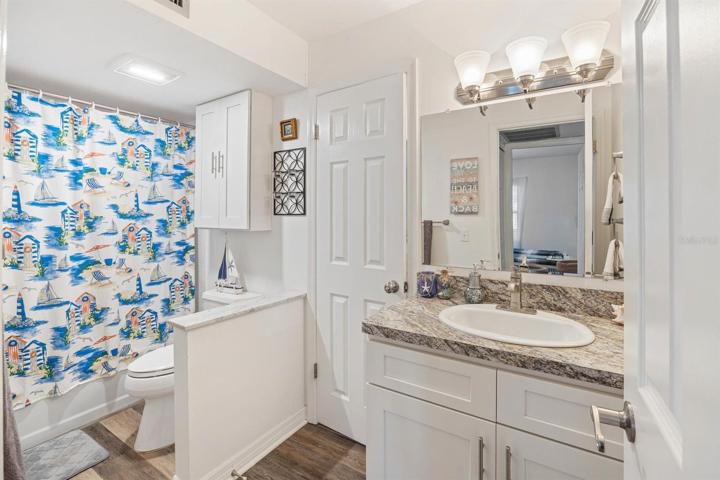 Bathroom vanity with hall to master walk in and laundry room