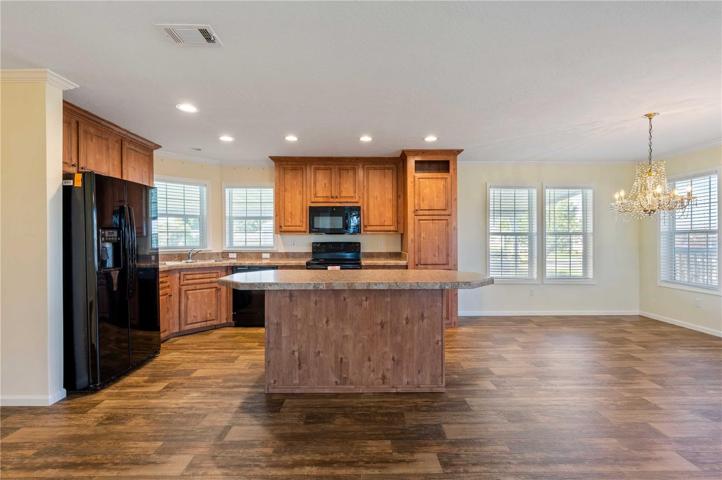 Large center island is great for added countertop space.