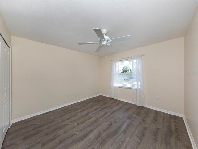 Bedroom #2 with luxury vinyl plank flooring