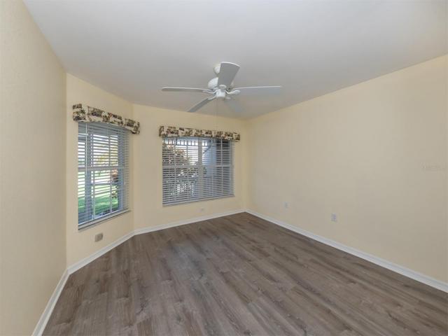 Bedroom #3 with luxury vinyl plank flooring