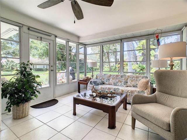 Florida Room with access to an outdoor courtyard