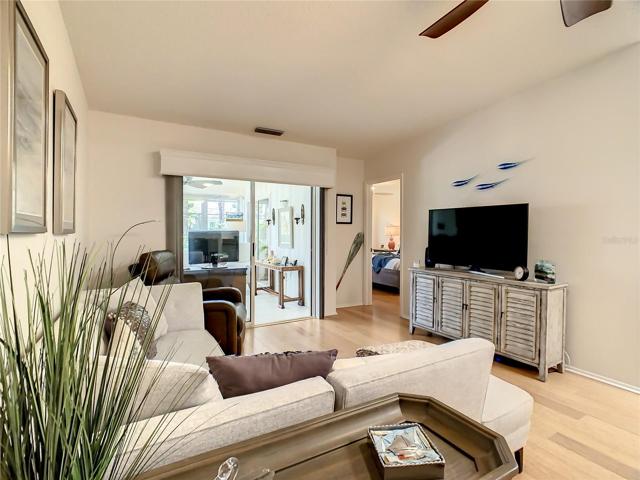 Family Room with sliding glass doors going to the Florida Room
