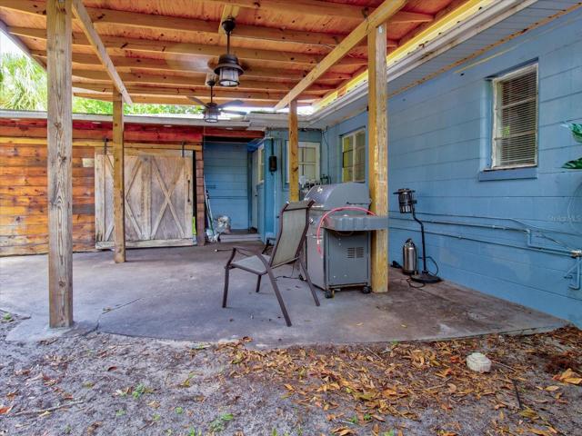 Fenced Patio Laundry Behind Barn Door