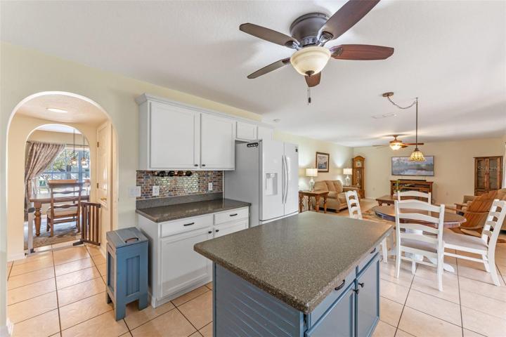 Open Kitchen with passthrough to formal dining area. An Area perfect for entertaining!