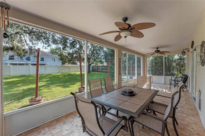 Screened back porch and a fenced-in backyard!