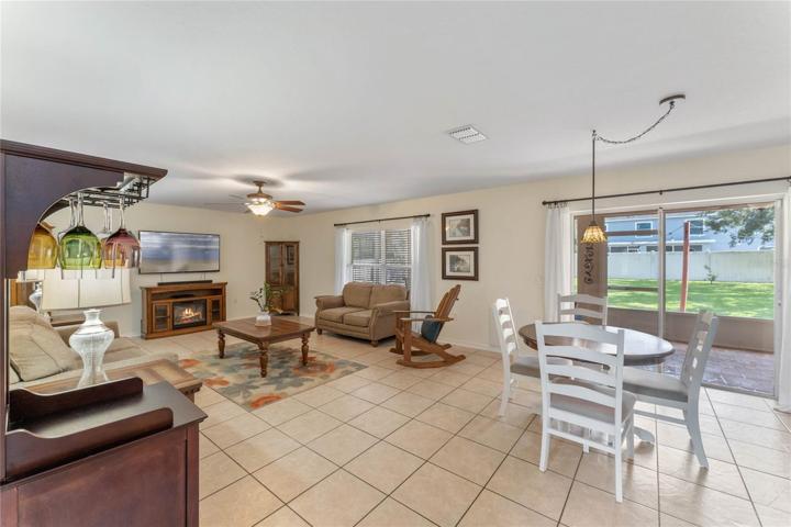 Enter the Great Room, which flows into the eat-in dining area, Chef’s kitchen, and Lanai.