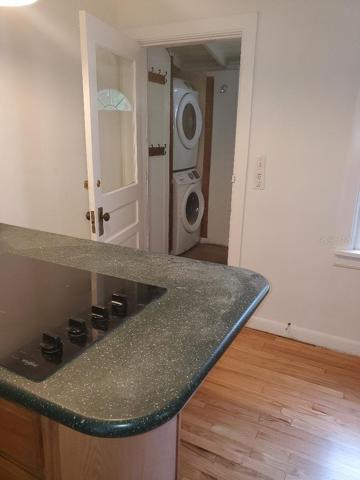 Refinished hardwood floor in Kitchen to laundry in rear foyer to yard & detached 2 car garage.