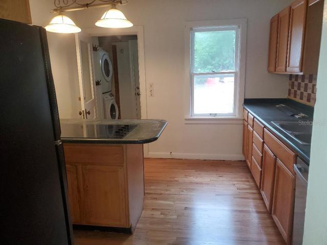 Refinished hardwood floor.