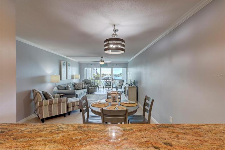 Our dining and living room offer a delightful setting to enjoy good company, delicious food, and the beauty of the outside world.