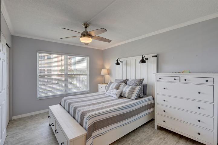 The  guest bedroom is like a peaceful retreat, that is beautifully appointed and has a large closet for plenty of storage.