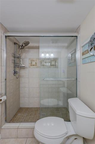 The Ensuite bath has a large tiled shower with beautiful sliding doors.