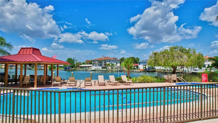 With its refreshing pool, comforting spa, and captivating water view, our outdoor space is a delightful retreat for relaxation and enjoyment.