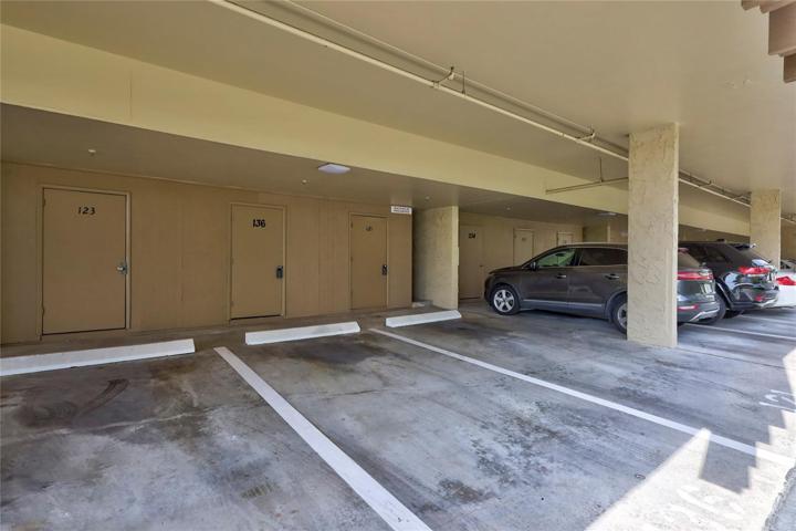 You will have 1 covered parking space and storage closet with is large and will fit all of your beach items and bikes.