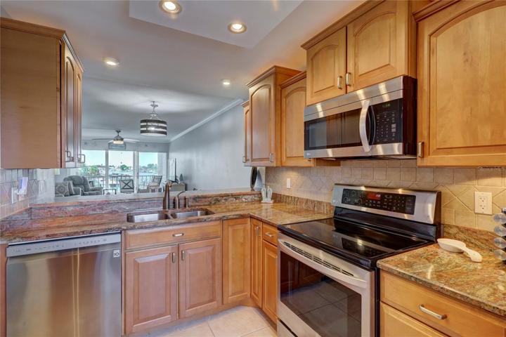 As you enter this home you will see the beautiful Kitchen area with Stainless Steel appliances and Yes a View.