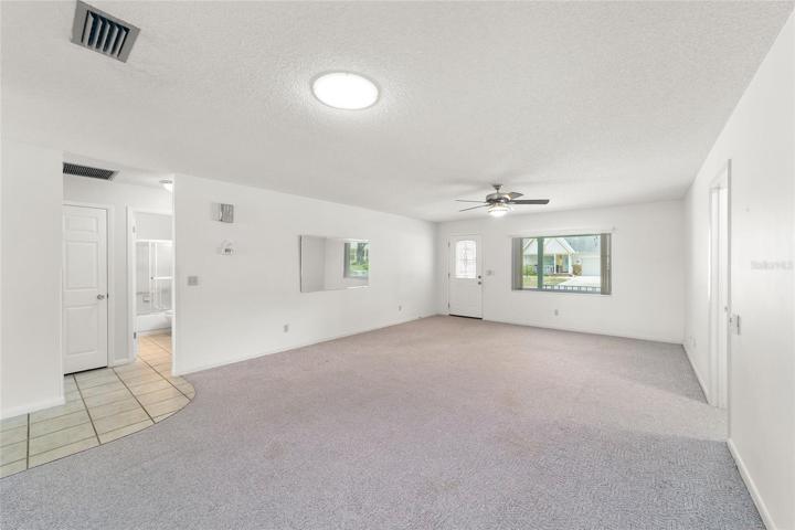 Skylights help brighten the combined living and dining room