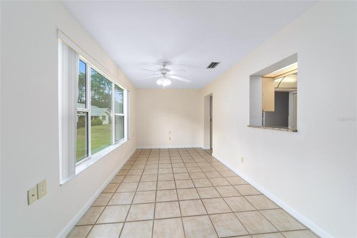 Space for anything you envision and a view to the backyard.