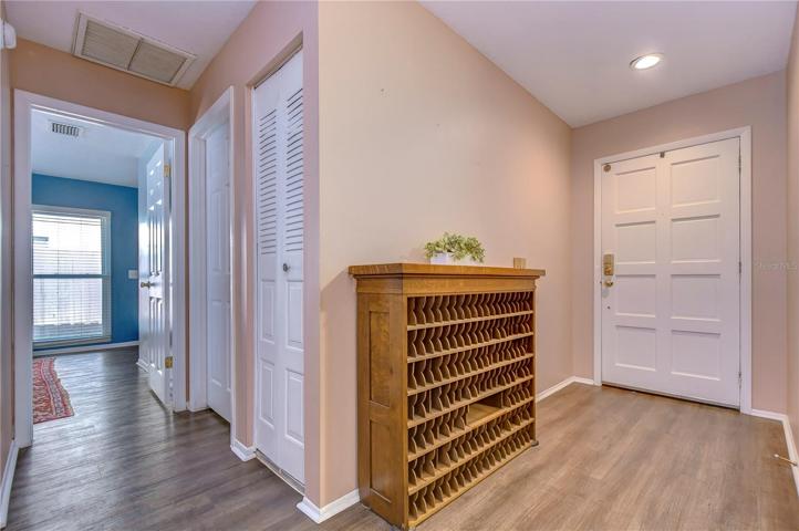 Entry showing newer LVP flooring