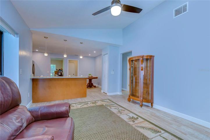 Family room with sliders to the pool