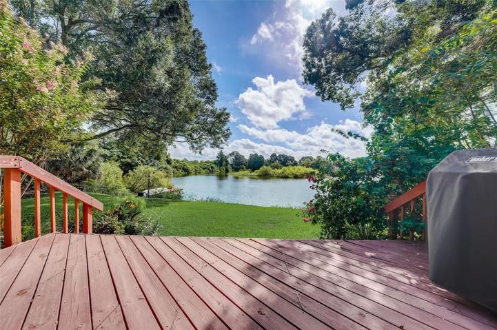 Deck off of the covered patio is perfect for outdoor grilling and enjoying the view.