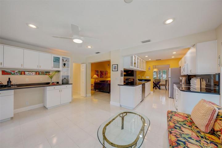 Lovely sunroom off the family room and kitchen.