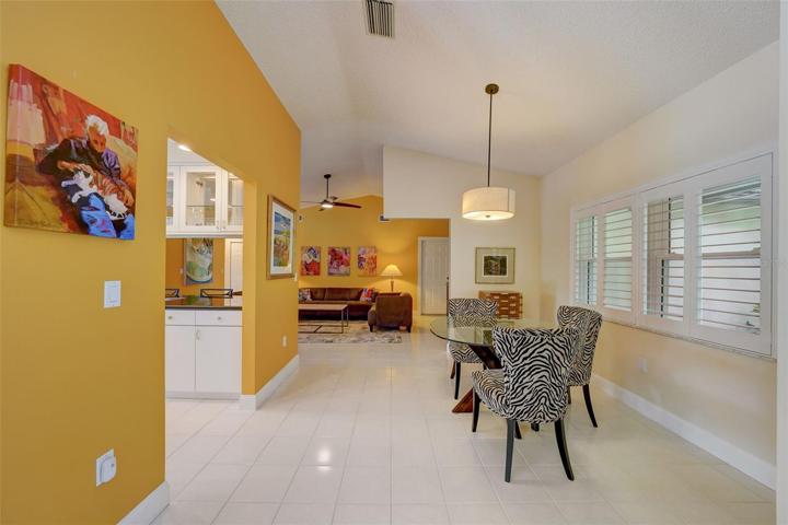 Dining area just off the kitchen with plantation shutters