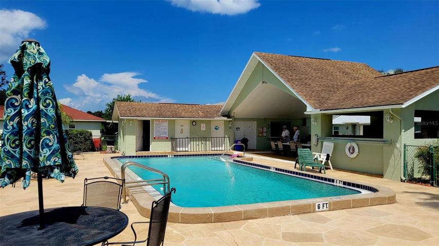 Pool w/bathrooms, shower & clubhouse.