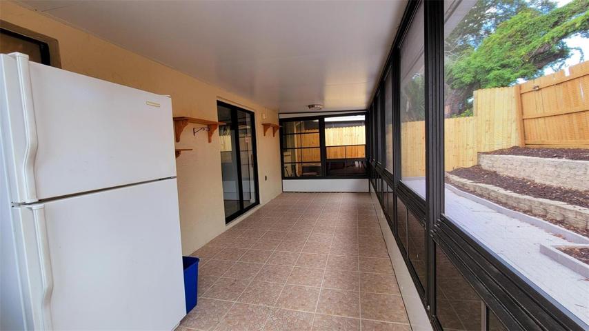 Lanai w/Refrigerator for extra storage.