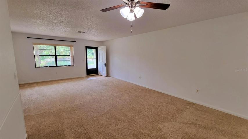 Living room w/pond views.
