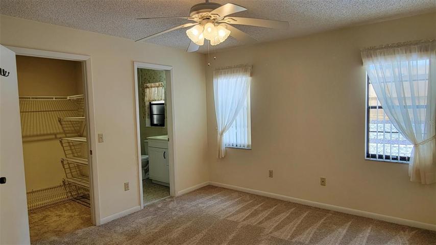 Master bedroom w/Walk-in closet & en-suite bath.