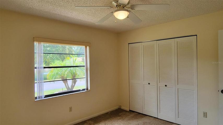 Bedroom 2 with pond views.