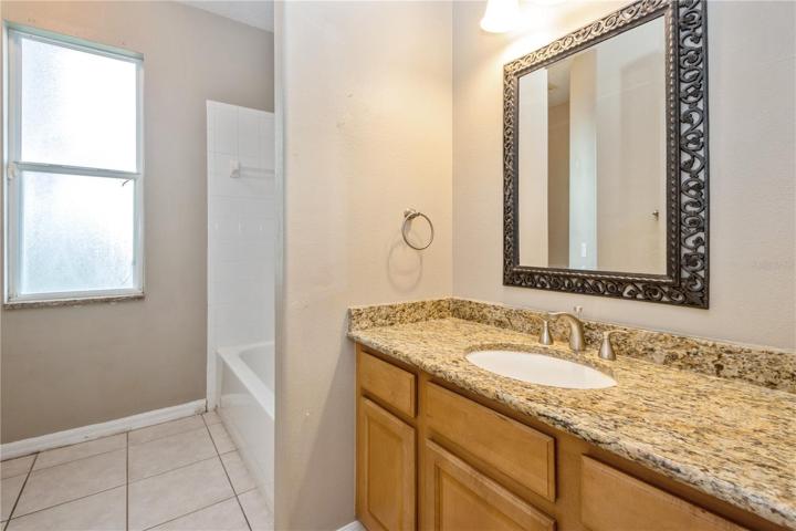 Second bathroom with tub / shower combo