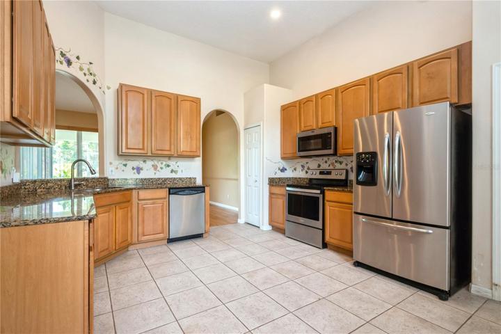 Kitchen shows cabinets and appliances