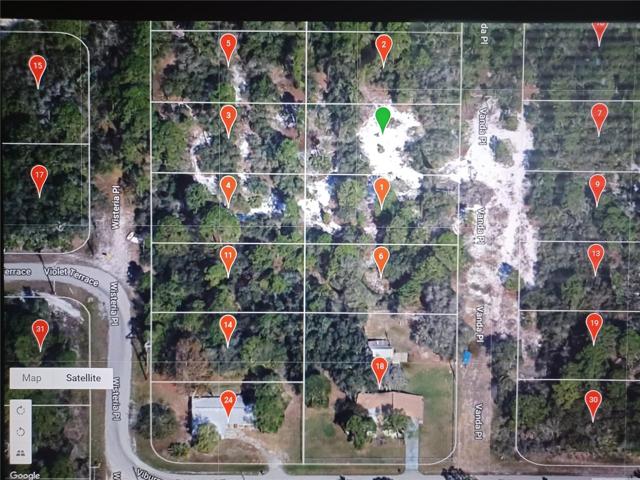 Green lamp is where the lot is located.