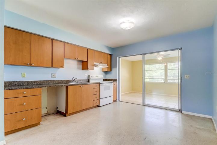 Unit 2 (West - 2BR 1BA Kitchen with sliders to Florida Room (possible 3rd BR)