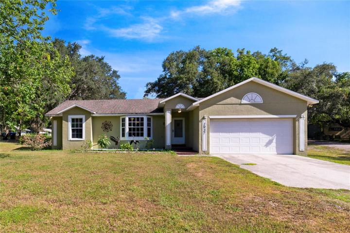 3/4 ACRE CORNER LOT with NO HOA and all major systems are in great shape!