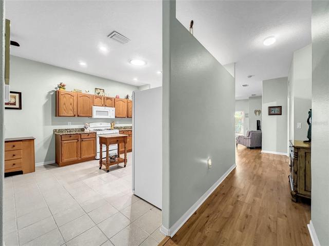 Hallway can lead to the kitchen or the Living Room