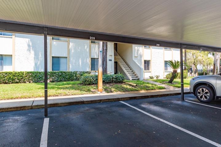 RESEVERVED COVERED PARKING SPACE PLUS ADDITIONAL GUEST PARKING