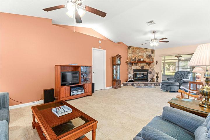 View of Living Room w/wood burning fireplace