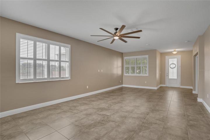 view of the formal living room and front door.