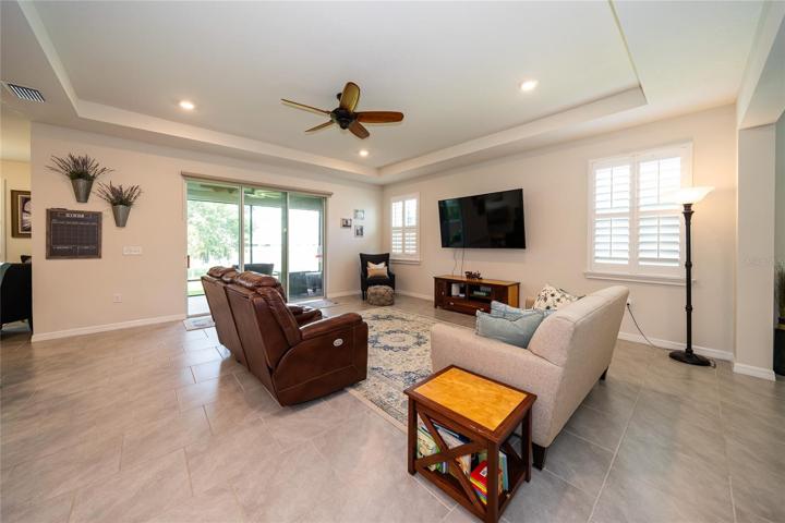 Spacious living area...remote controlled shade on slider to lanai!