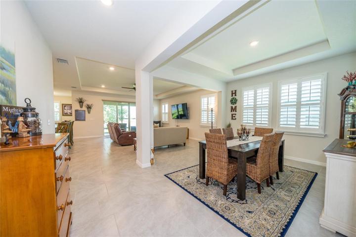 Some homeowners have chosen to enclose this dining area as an office.
