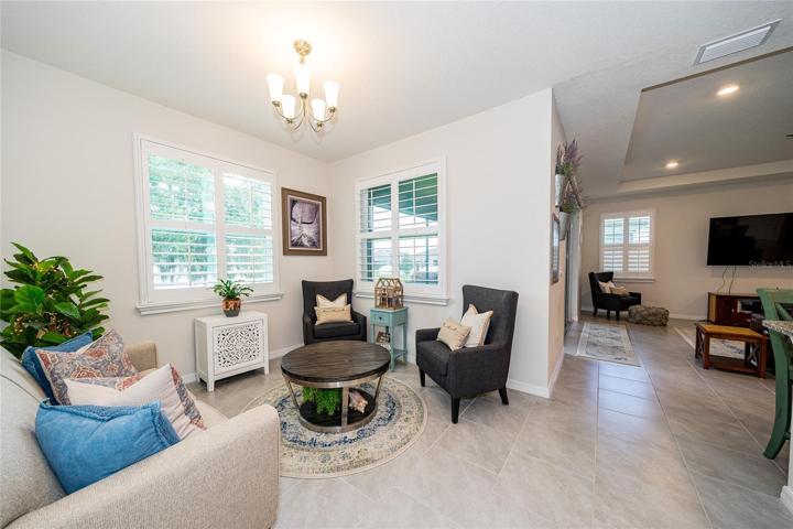 This can be utilized as another dining area, breakfast area or sitting area.