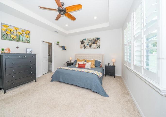 Private Owners bedroom (separated from other bedrooms) looks out towards the pond